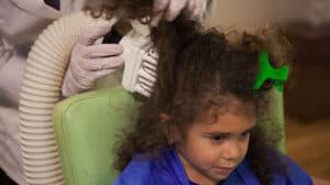 Heated air device being used oncurly hair